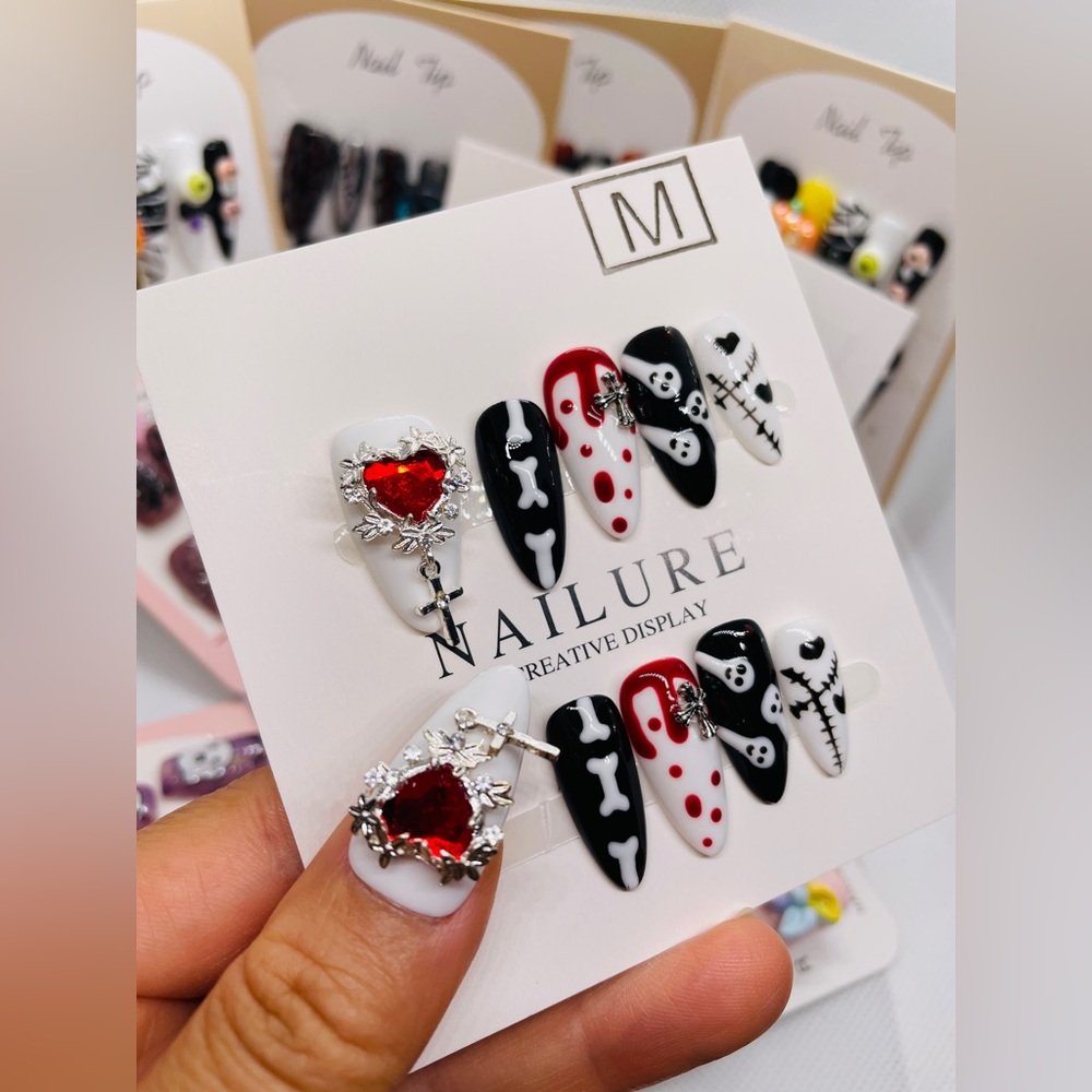 Custom made: Gel nails in Black , white and Red. Re-usable